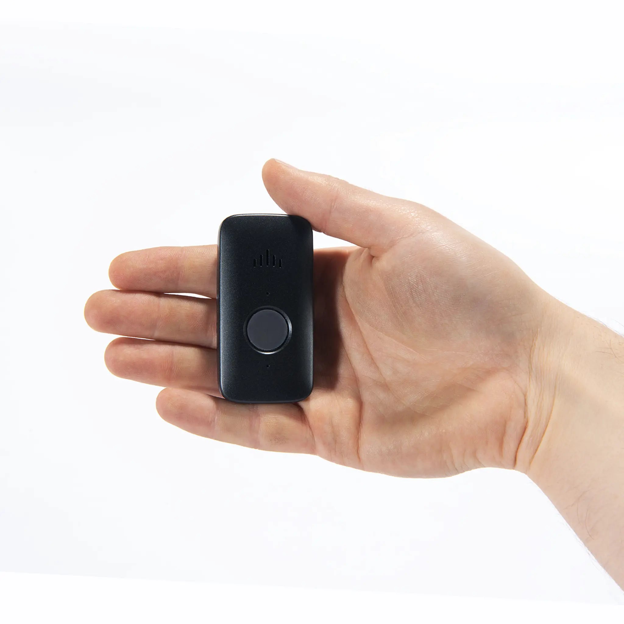 A hand holding a Belle X device.