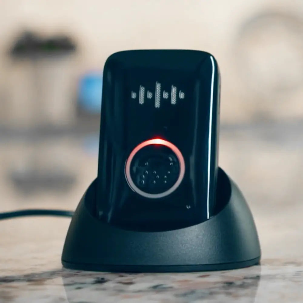 Belle S device on it's charging dock. 